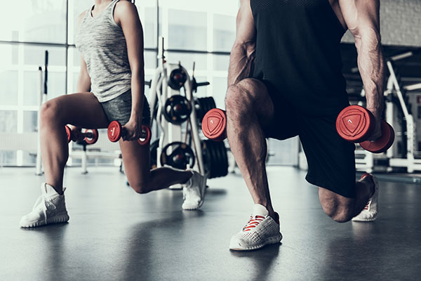 Man and Woman Exercising