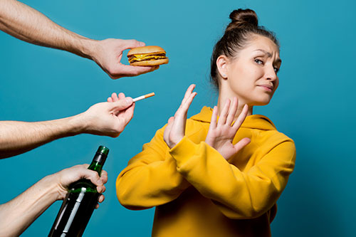 Woman Saying No to Bad Habits