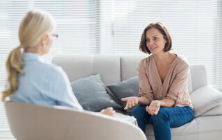 Woman talking to a therapist