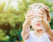 Child with water glass