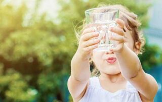 Child with water glass